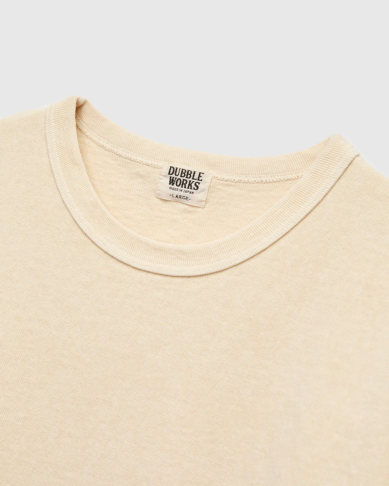 Stand Wheeler Pigment-Dyed T-Shirt in Cream - Image 3